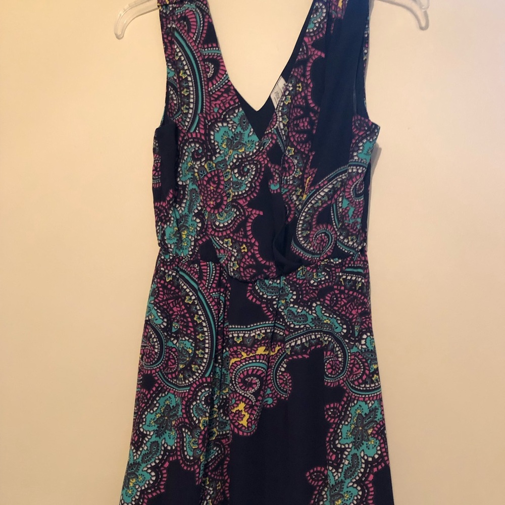Navy dress with teal and pink accents.